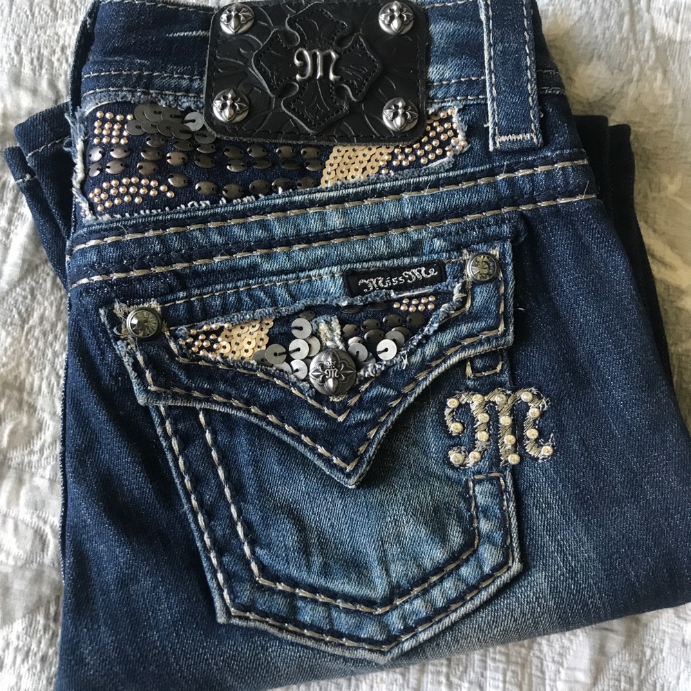 Miss Me boot cut blue denim jeans.